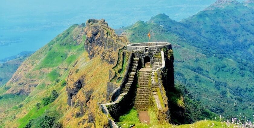 Majestic view of Gumtara Fort perched on a hill and surrounded by lush greenery.