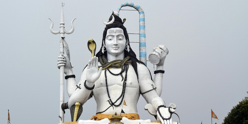 A Shivling is located in the middle of a cave which is surrounded by pristine water