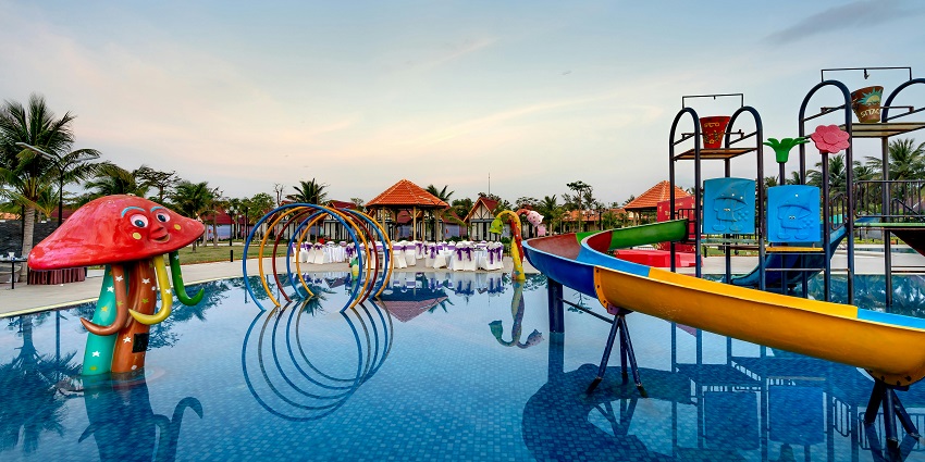 An image of an adventure park near Thane featuring colourful inflatables floating in the pool.