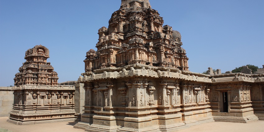 Intricate carvings of the Hazararama Temple in Hampi, showcasing ancient architectural beauty.