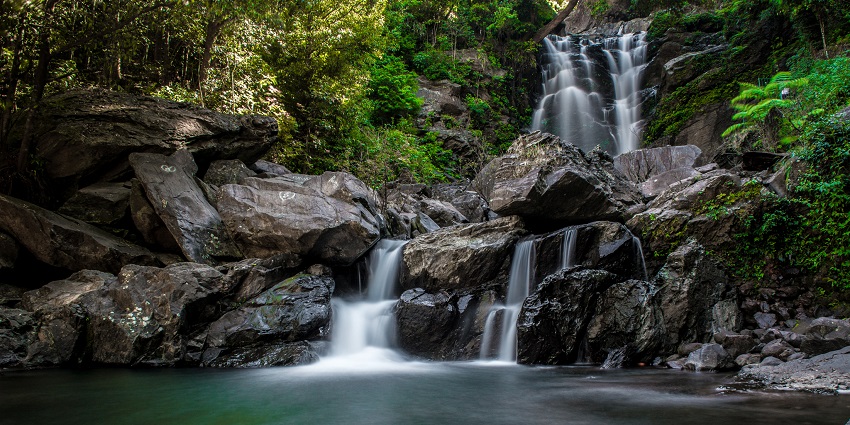 A glimpse of Hanumana Gundi Falls is a tiered waterfall gushing down onto natural rocks.