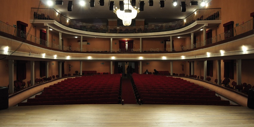 Image of the scenic auditorium and its beautifully decorated interiors