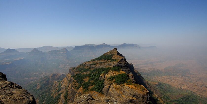 See the ancient charm of a traditional fortress, echoing the grandeur of Harishchandra Fort.