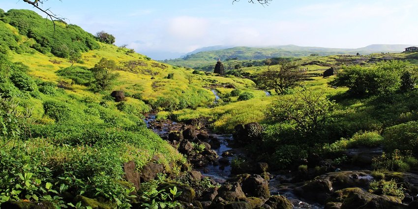 A beautiful view seen from the Harishchandragad Fort, a popular place near Shivneri Fort