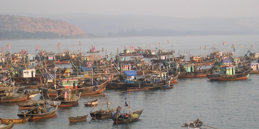 Harnai fishing boats by the shore, a scenic stop among places to visit near Ratnagiri