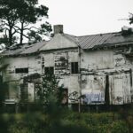 A glimpse of a spooky house nestled in Maharashtra surrounded by lush greenery.