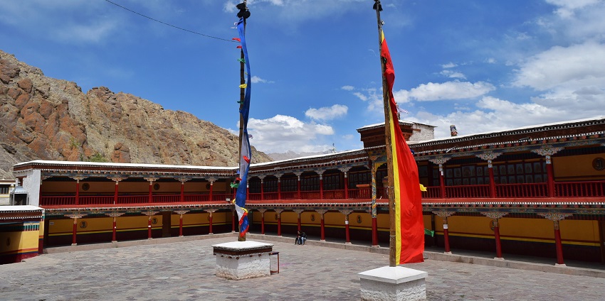 Image of inside view of Hemis Monastery with stunning architecture under clear blue sky
