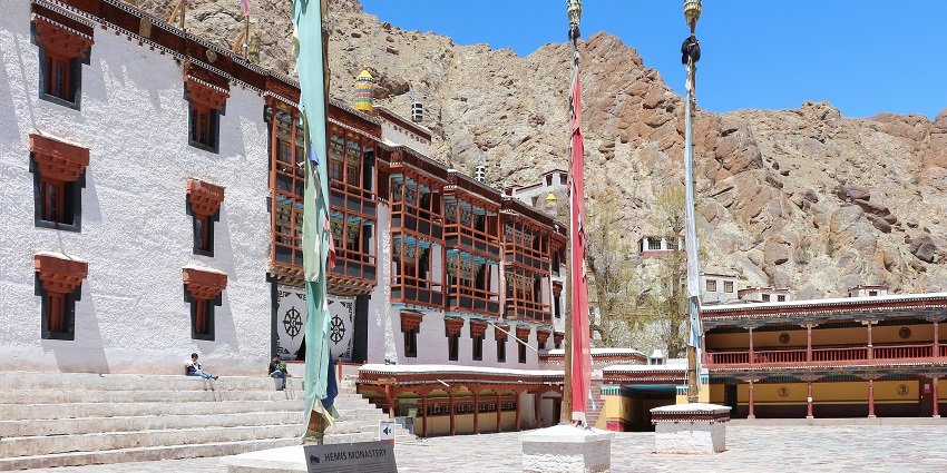 Inside the courtyard of Hemis monastery surrounded by rugged hills