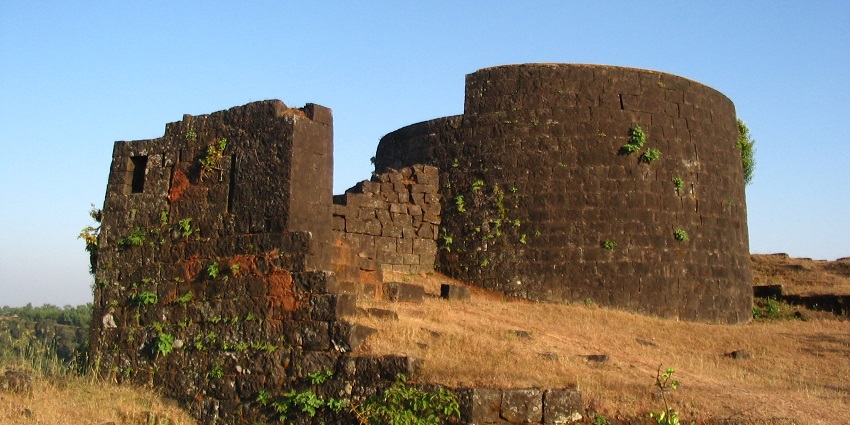 Remote fort surrounded by nature, ideal for trekking enthusiasts and adventure seekers
