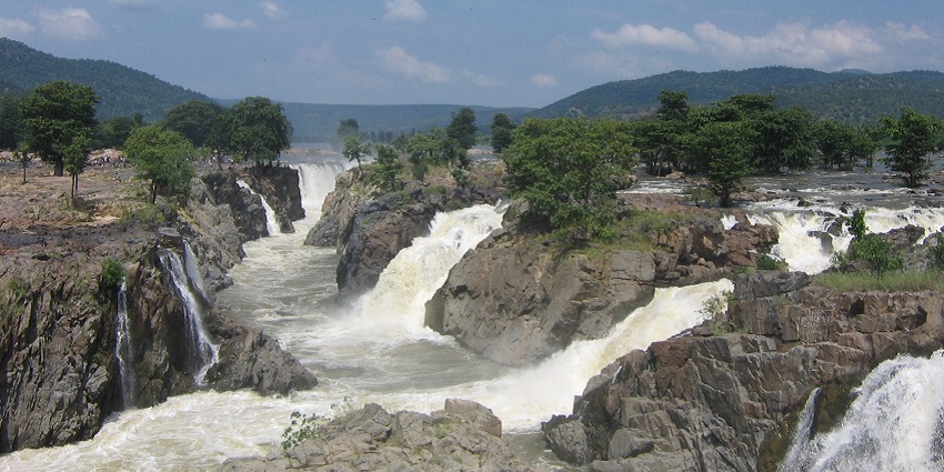 Hogenakkal Waterfalls cascading through rocky terrain - the best waterfall in Coimbatore.