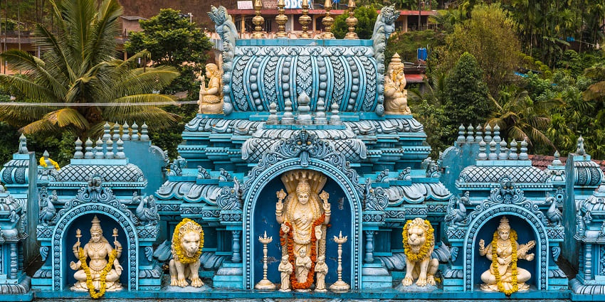 The entrance of Horanadu Temple marked with holy deities.