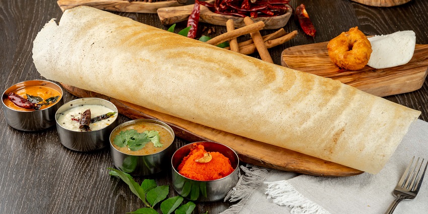 Paper Dosa served on a plate with a variety of chutneys and Sambar along with Medu vada
Viewers of this file can see comments and suggestions
