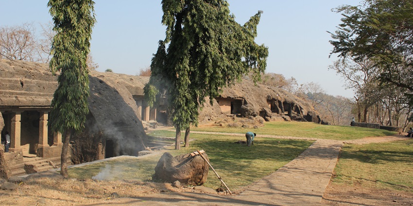 Mahakali Caves, showcasing intricate rock-cut structures in Mumbai's historic site.