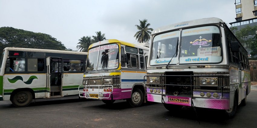 Buses parked at Goa bus station awaiting visitors to travel to Mario Miranda Museum Goa.