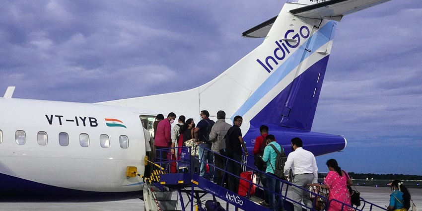 An image of the passengers onboarding the flight for a visit to Ashlakshmi Temple.