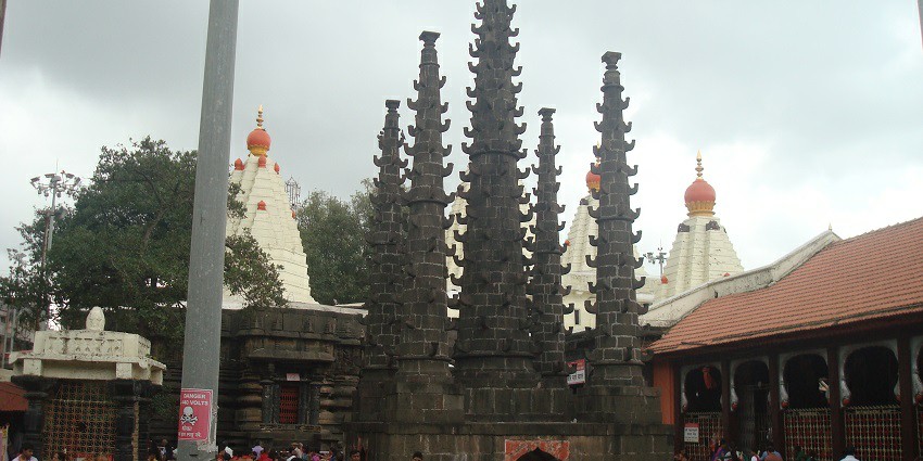Inside the courtyard of Jyotiba temple, with devotees walking around