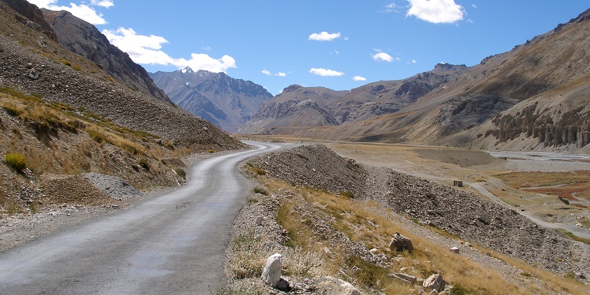 Image of Leh-Manali Highway. Ladakh, India - twisty road and mountains under clear blue sky