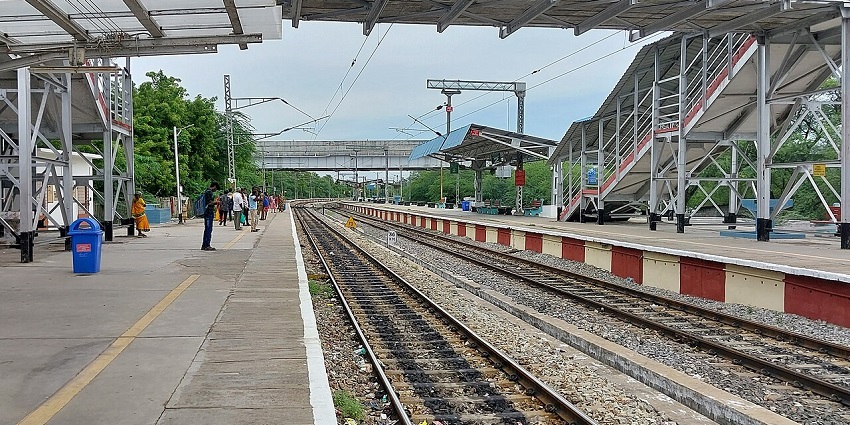 A view of Kanchipuram railway station in Tamil Nadu with people waiting in the background