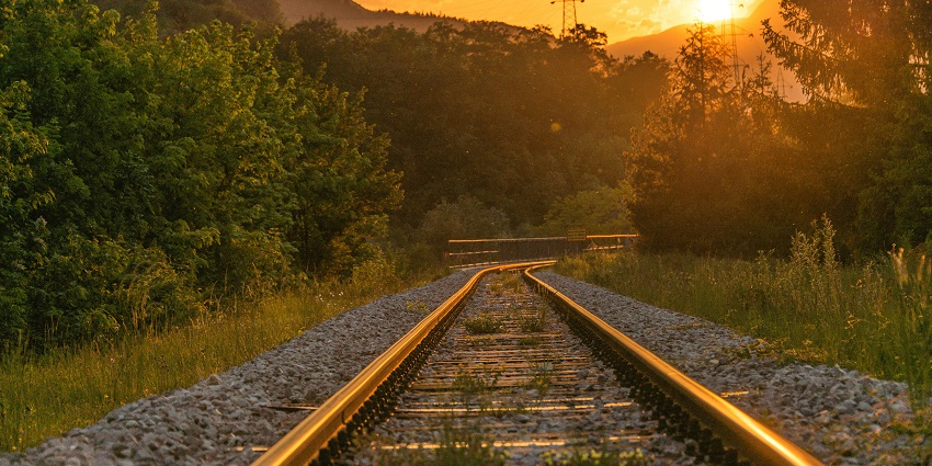Jaipur-bound train departing from Sikar and moving through green rural landscapes.