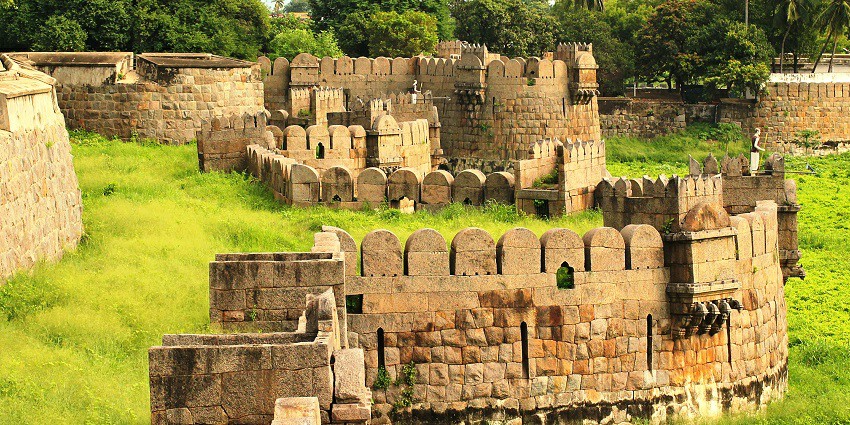 View of the fort walls spreading vast on the verdant feilds