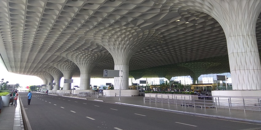 Chhatrapati Shivaji Maharaj International Airport against a scenic backdrop.