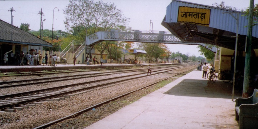 The view of Jamtara train station in Jharkhand with people waiting for the train.