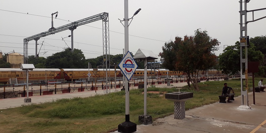 The railway station picture in Tamil Nadu where people are waiting for the train to arrive.