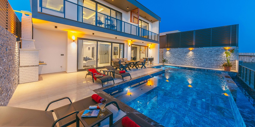 Pool party in Gurgaon with modern rooms, dining, and event spaces.