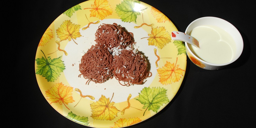 Soft string hoppers made from rice flour, served with curry