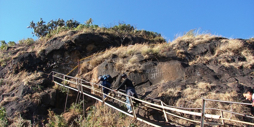 Tourists at steps leading to Kalsubai Peak near Igatpuri in Ahmednagar District.