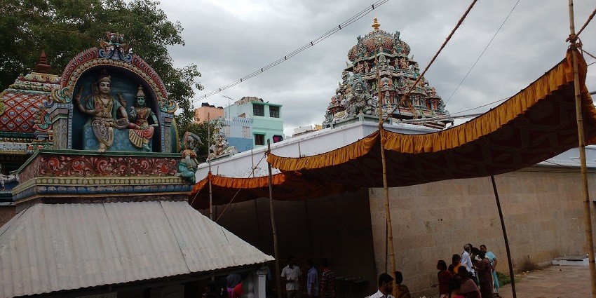 An image of Immaiyilum Nanmai temple in Madurai, featuring intricate architecture.