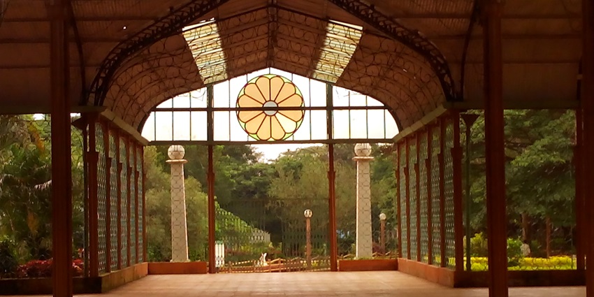 Indira Gandhi Glass House Garden features vibrant flowers and manicured lawns