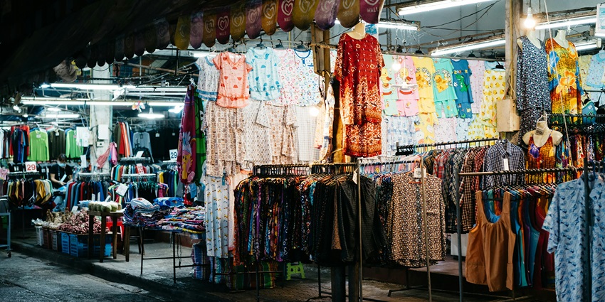 Irla Shopping Street features a vibrant market for clothing, electronics, and accessories.