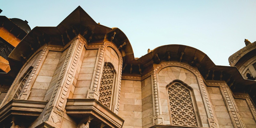 The beautiful facade of a temple with intricate architectural details.