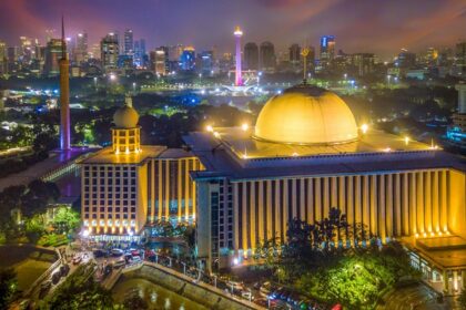 A representative picture of Istiqlal Mosque illuminated at night.