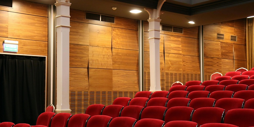 An inside view of the famous Jagriti Theatre, a tourist attraction in Karnataka.