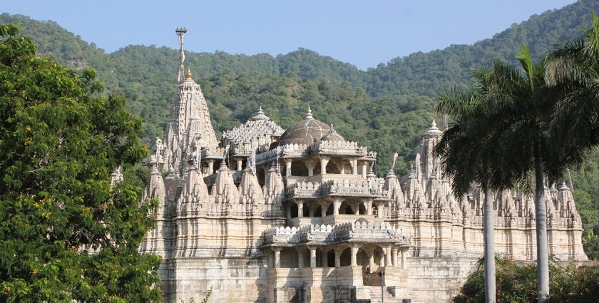 Picturesque view of the Mahaveer Jain temple surrounded by greenery, one of the best Jain temples in Goa