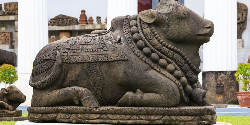 The stone sculpture of a cow in the inner yard of the National Museum Jakarta, Indonesia