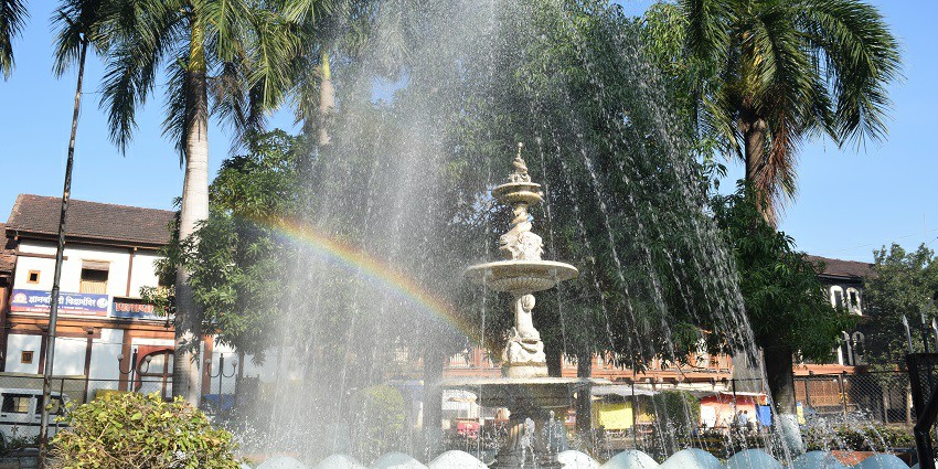 An image of a beautiful fountain with a rainbow at Jawahar Rajwada or Jai Vilas Palace.