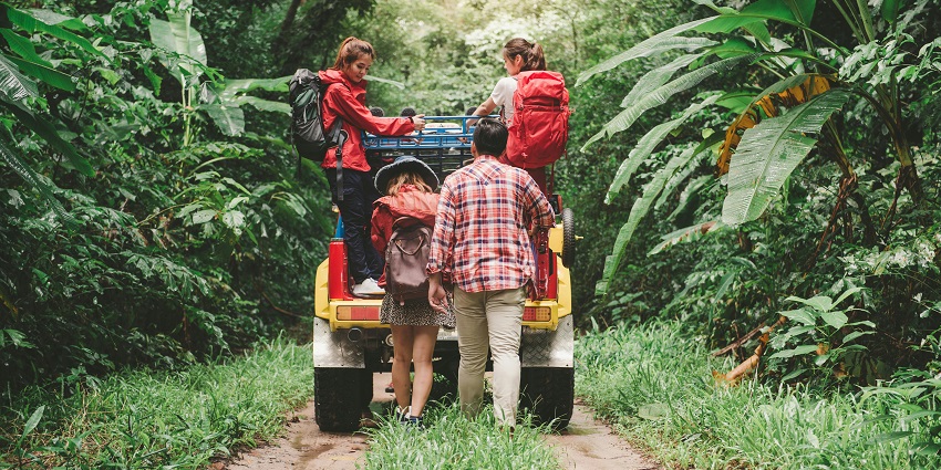 A picture of a few people enjoying a safari jeep which is one of the things to do in Anaikatti.