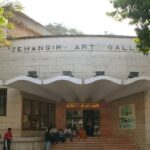 Exterior view of Jehangir Art Gallery in Mumbai, highlighting its architecture.