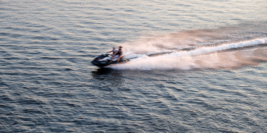 An image of two jet skiers racing across the waves, one of the best Malvan Water Sports.