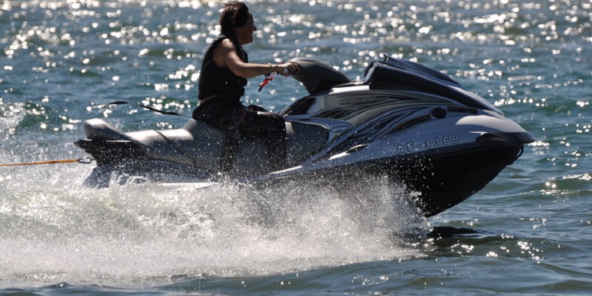 A picture of jet skiing, one of the thrilling water sports in Alibaug.