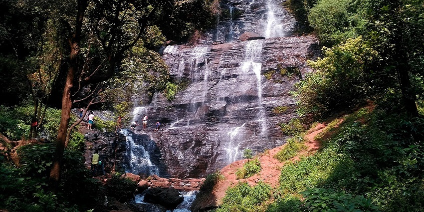 Jhari Waterfalls feature stunning cascades surrounded by lush greenery and adventure