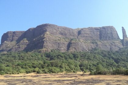 Jivdhan Fort, a captivating tourist attraction near Maharashtra, set amidst lush landscapes.