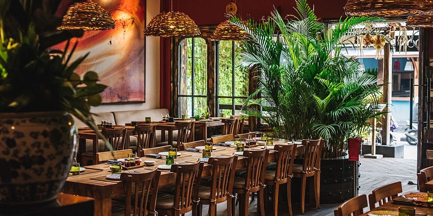 Casual dining scene at a lively restaurant, in the Eat street of Seminyak