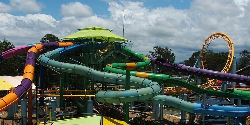 Thrilling cyclone at Jurassic Park with many other slides winding in the background