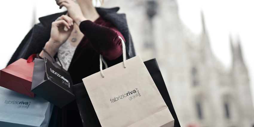 Image of woman holidaing shopping bags and fancy place for saree shopping in Mumbai