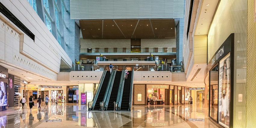 A wide view of vibrant shopping in Tirupati, filled with colourful stalls.