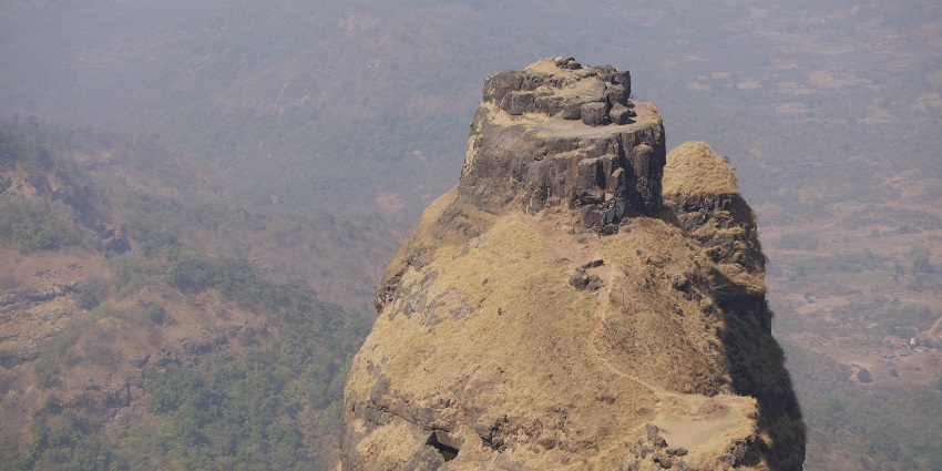 An image of the steep climb of Kalavantin Durg with breathtaking views in the background.